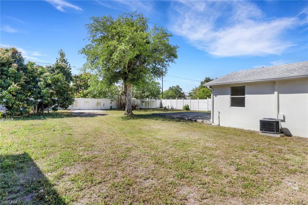 5326 Dixie Drive Naples, FL 34113 - Photo 21 of 25 a view of a house with a yard