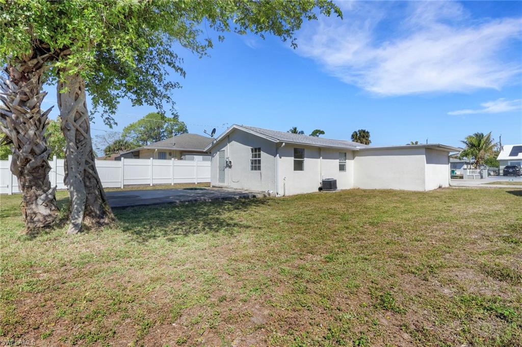 5326 Dixie Drive Naples, FL 34113 - Photo 23 of 25 a view of a house with a yard