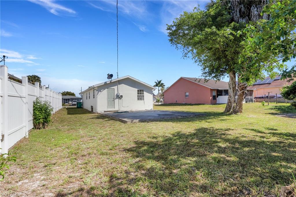 5326 Dixie Drive Naples, FL 34113 - Photo 24 of 25 a house view with a garden space