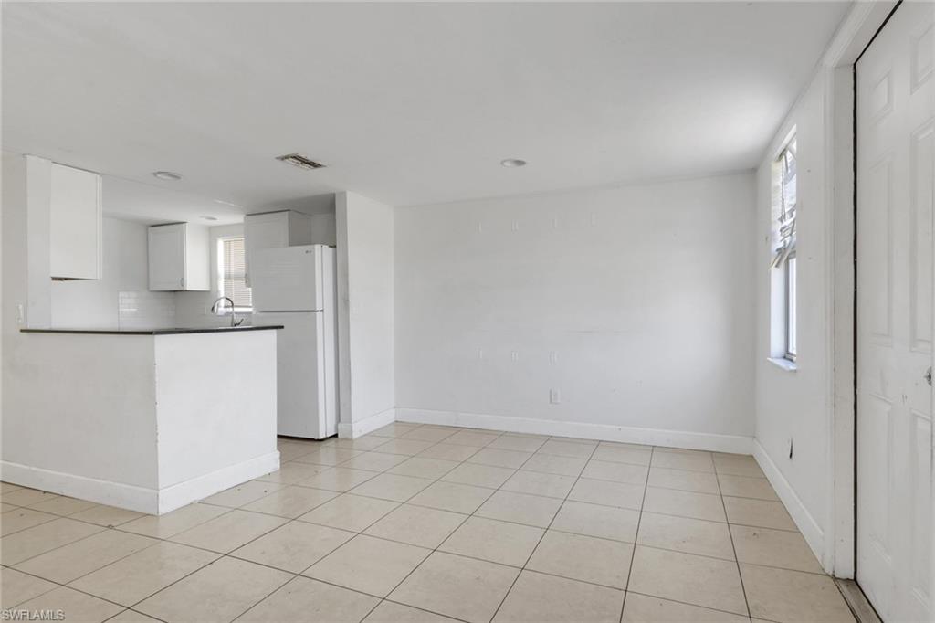 5326 Dixie Drive Naples, FL 34113 - Photo 3 of 25 a view of kitchen with white cabinets