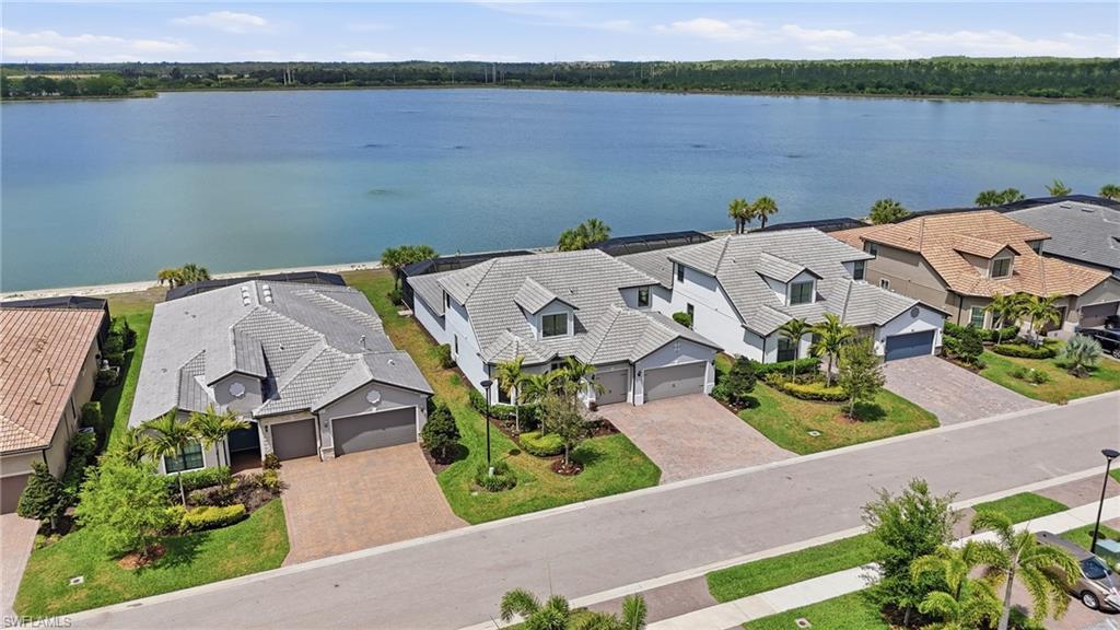 19696 Aqua View Lane Fort Myers, FL 33913 - Photo 5 of 50 an aerial view of a house with a lake view