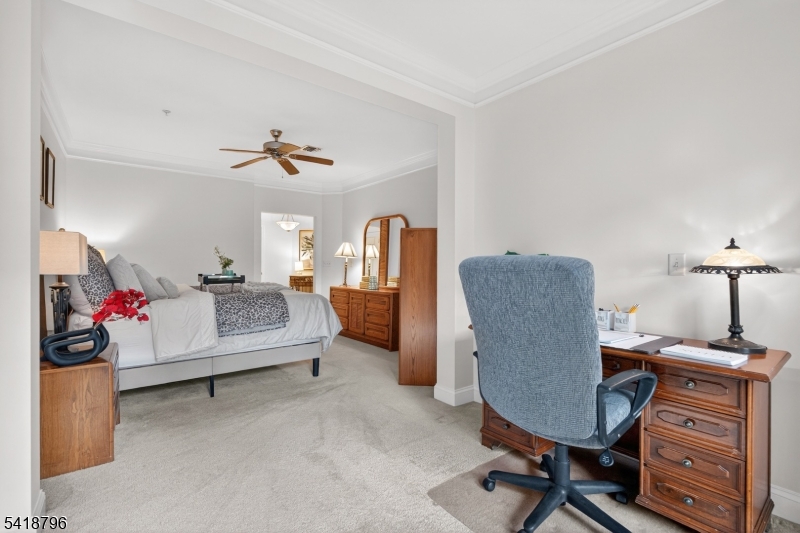 9210 Ravenscroft Road Clifton, NJ 07013 - Photo 10 of 18 a view of a workspace with furniture and a livingroom