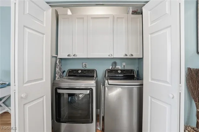 a kitchen with stainless steel appliances granite countertop a stove and a refrigerator