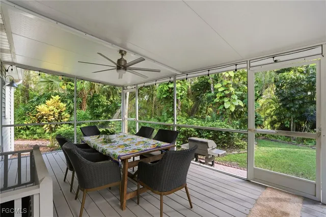 a view of a patio with a table chairs and a table