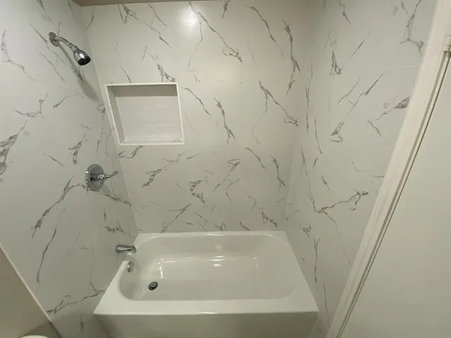 a bathroom with a bathtub