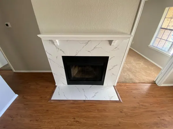 a living room with a fireplace