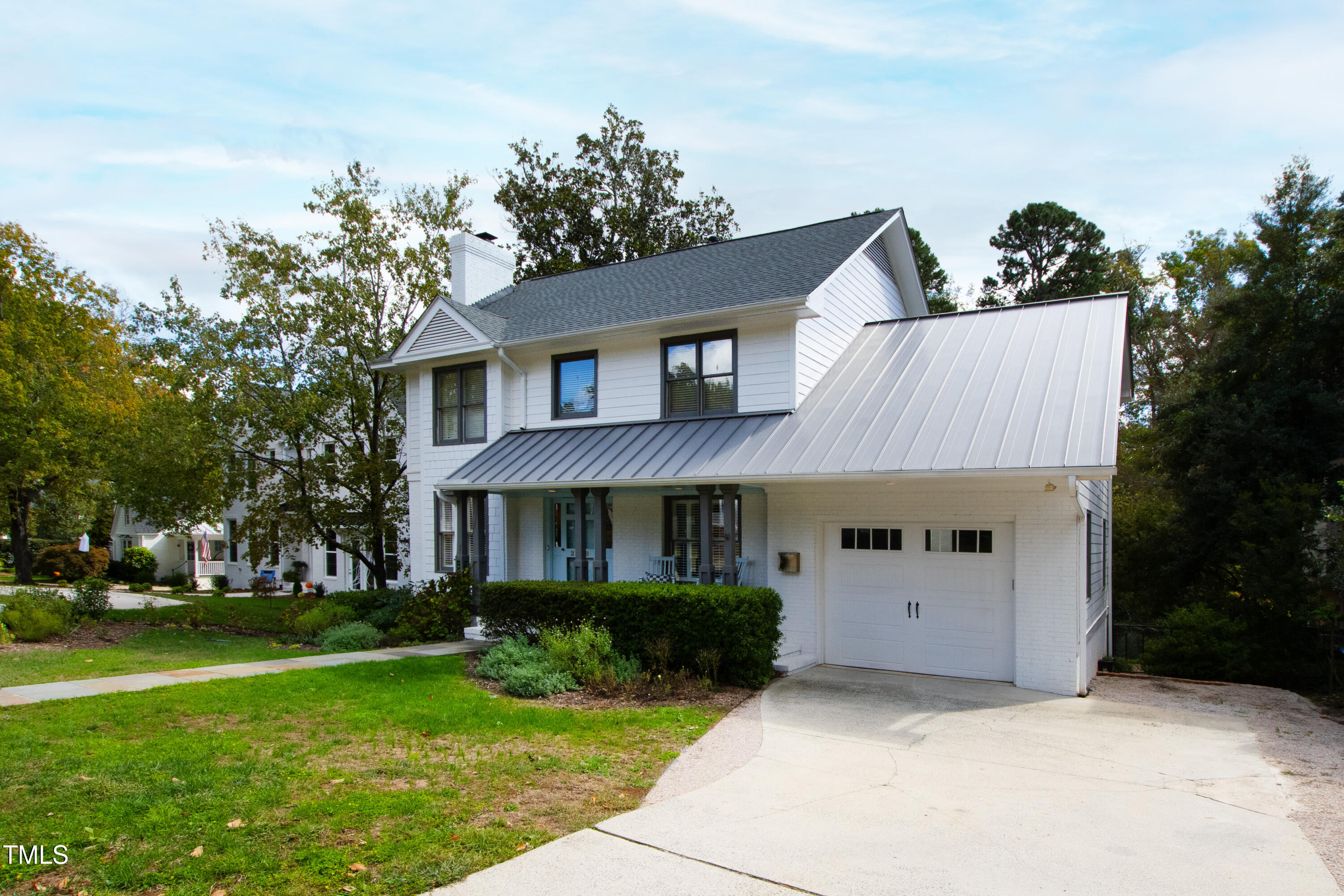 2308 Hales Road Raleigh, NC 27608 - Photo 2 of 5 a front view of a house with a yard