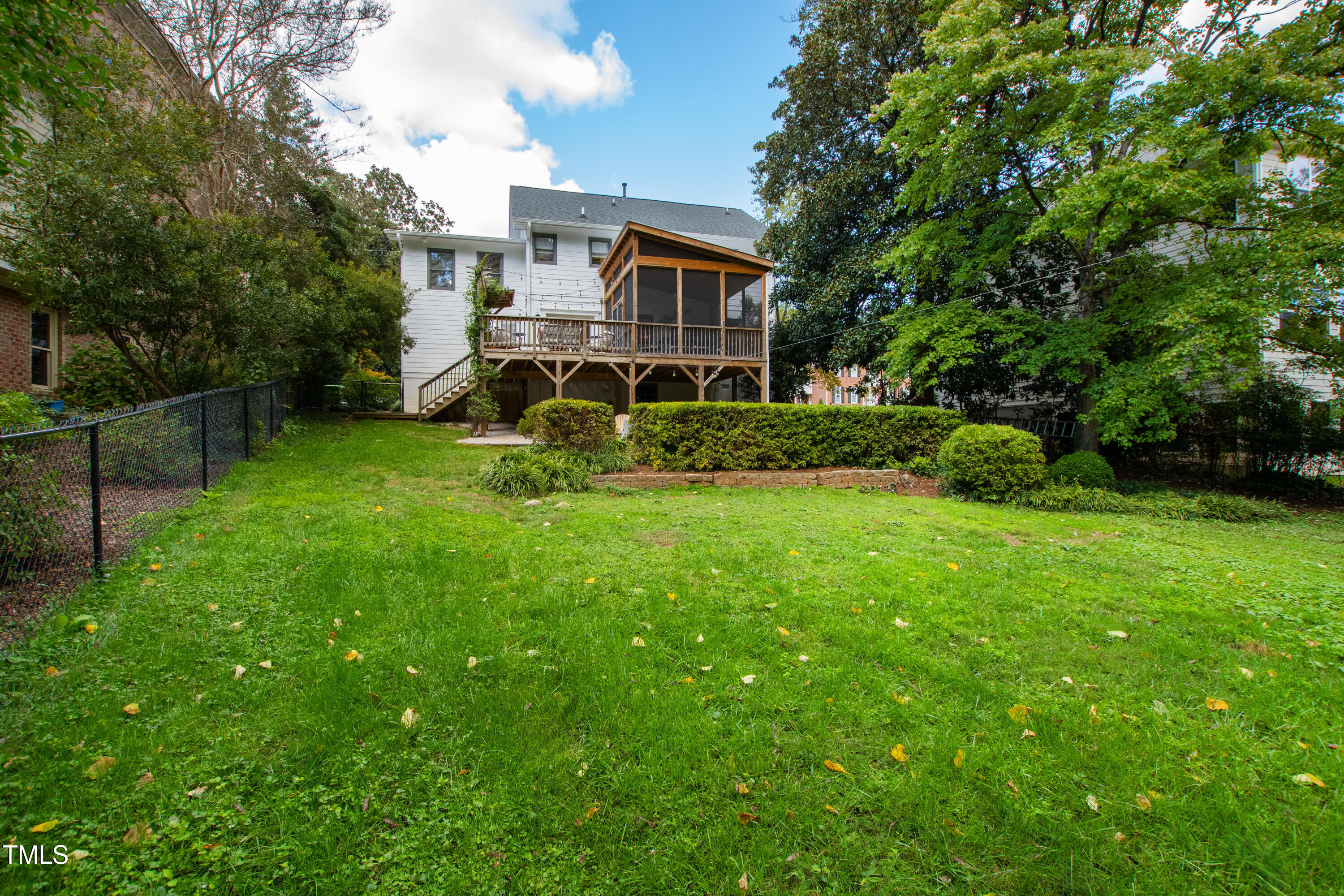 2308 Hales Road Raleigh, NC 27608 - Photo 5 of 5 a view of a house with backyard and garden