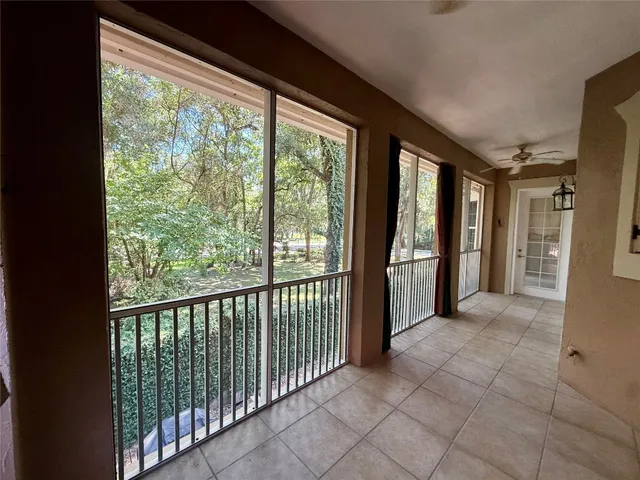 a view of a room with windows