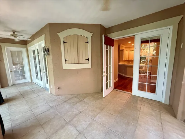 an empty room with windows