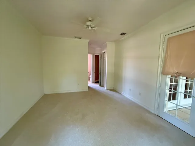 an empty room with a bathroom