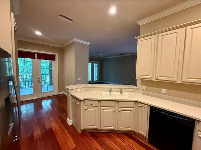 a bathroom with a sink and a large window
