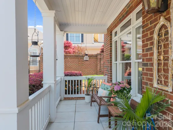 a outdoor space with lots of potted plants