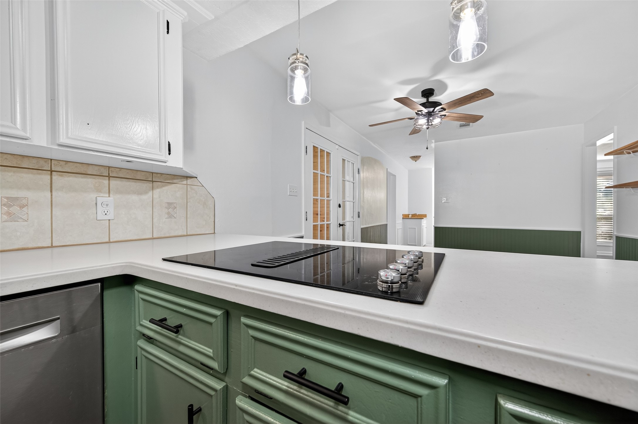202 Laura Lane Conroe, TX 77385 - Photo 16 of 31 a kitchen with a sink a cabinets and window