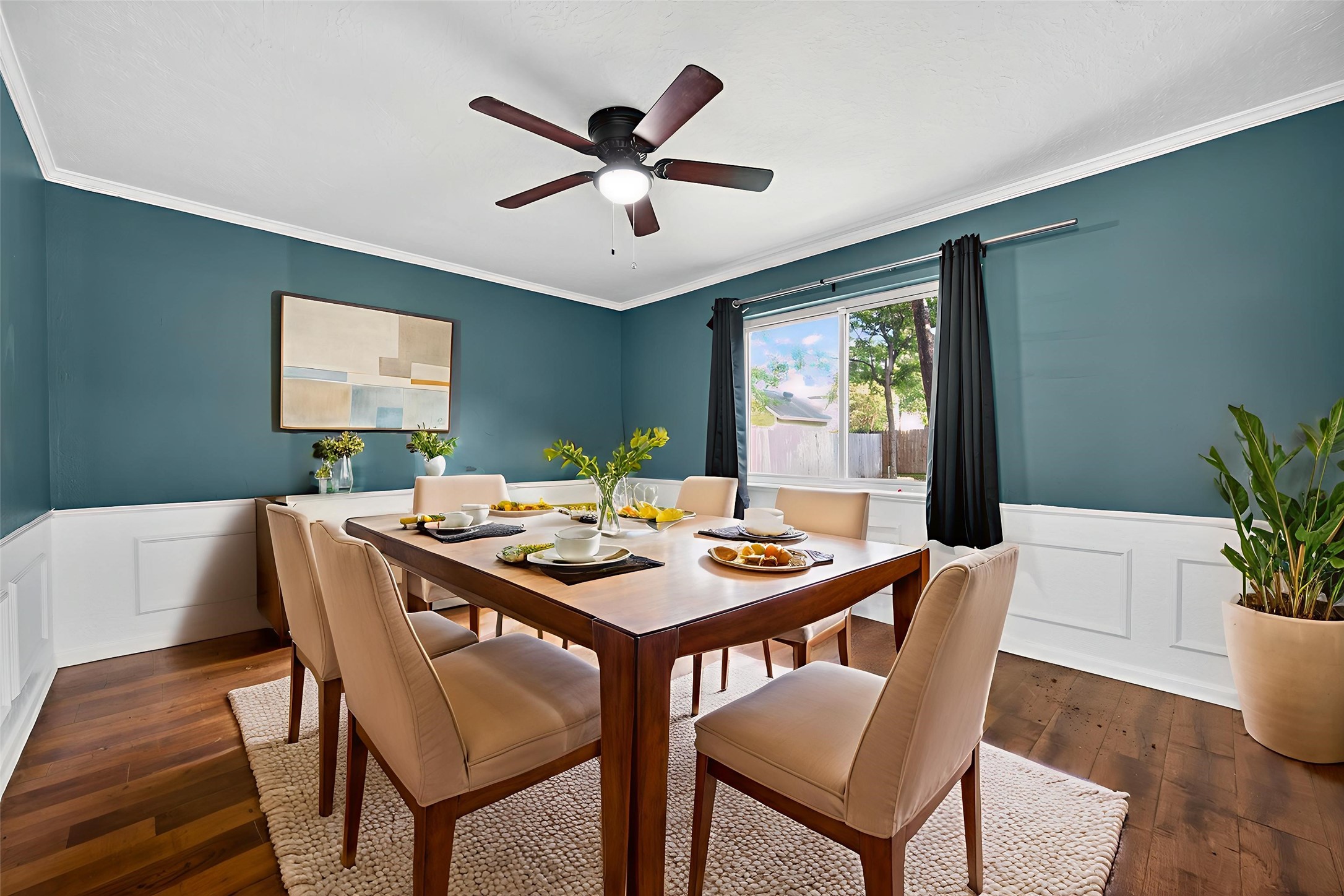 202 Laura Lane Conroe, TX 77385 - Photo 18 of 31 a view of a dining room with furniture window and wooden floor
