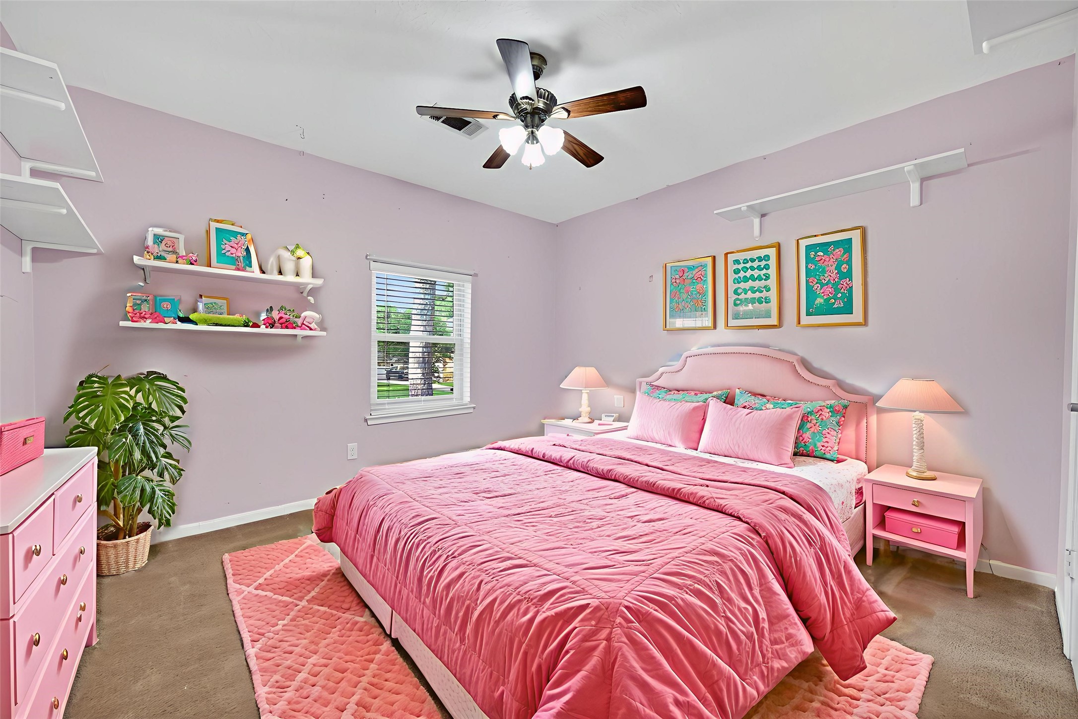 202 Laura Lane Conroe, TX 77385 - Photo 21 of 31 a bedroom with bed and a chandelier