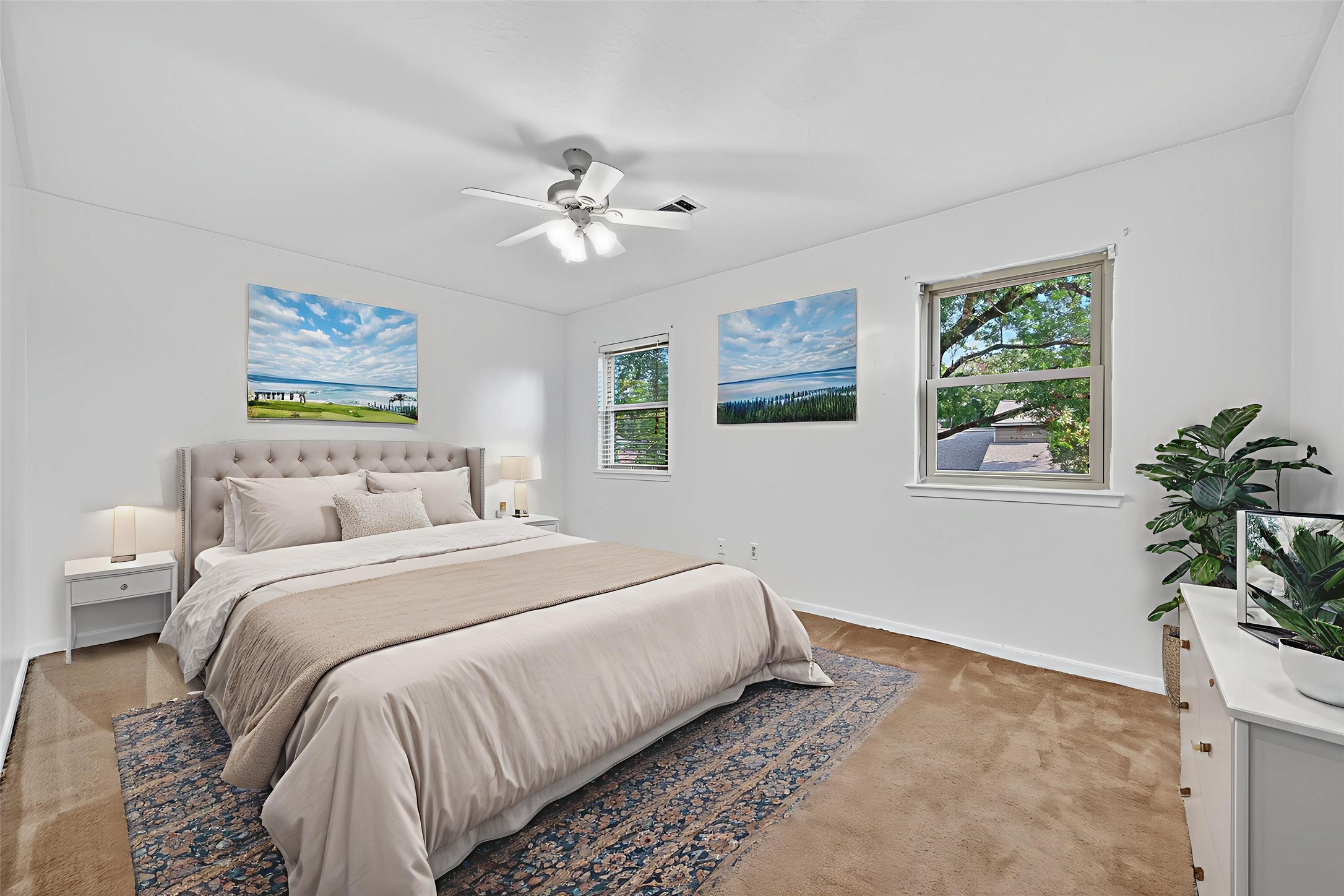 202 Laura Lane Conroe, TX 77385 - Photo 22 of 31 a bedroom with bed and a window