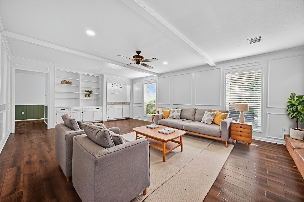 202 Laura Lane Conroe, TX 77385 - Photo 4 of 31 a living room with furniture and a wooden floor