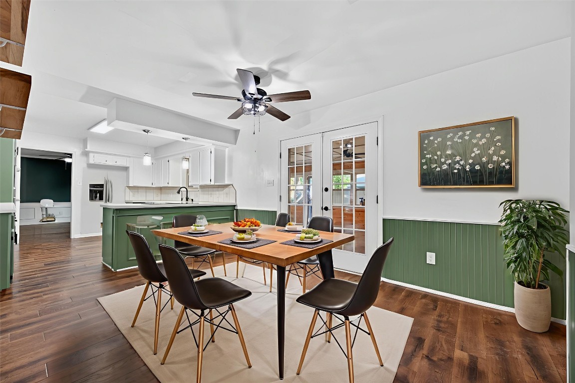 202 Laura Lane Conroe, TX 77385 - Photo 7 of 31 a view of a dining room with furniture and wooden floor