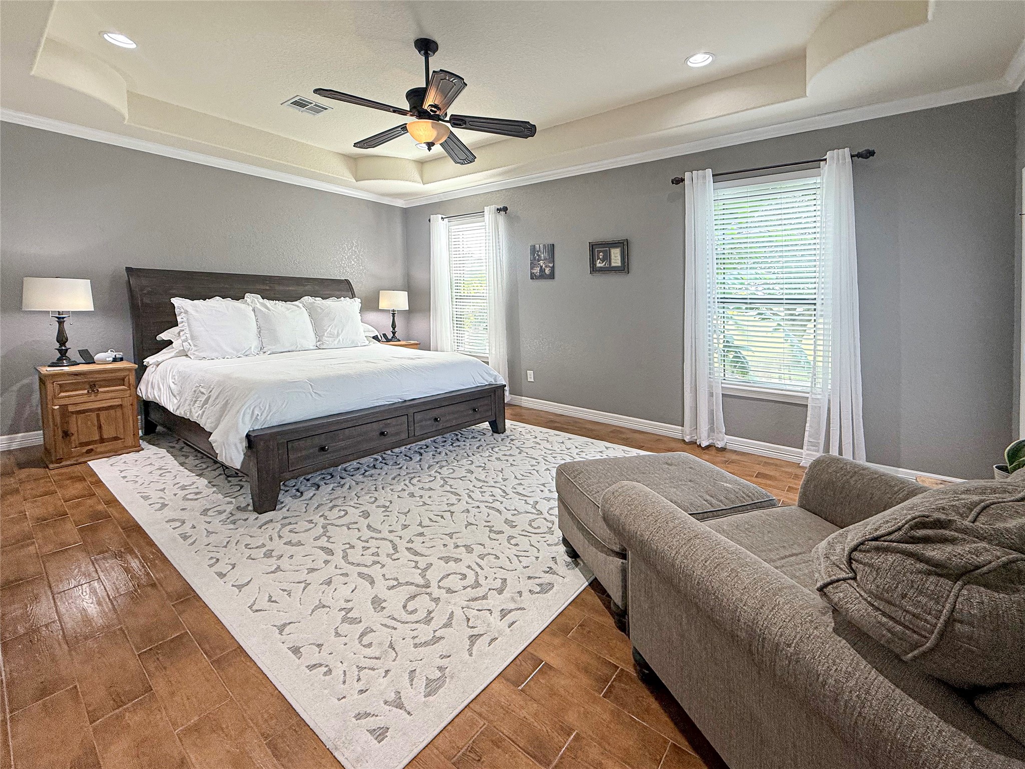 807 Mill Road Angleton, TX 77515 - Photo 21 of 46 Spacious primary suite with private backyard access and beautiful bayou views.