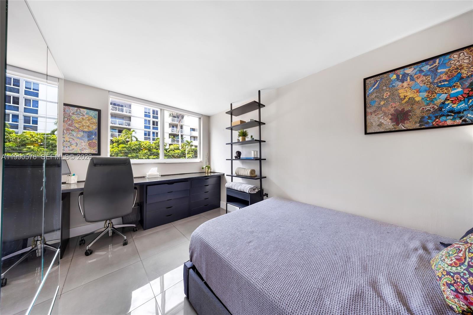 1665 Bay Road, Unit 221 Miami Beach, FL 33139 - Photo 16 of 33 a bedroom with a workspace