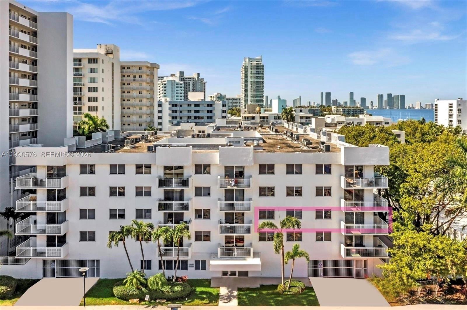1665 Bay Road, Unit 221 Miami Beach, FL 33139 - Photo 30 of 33 a city view with tall buildings