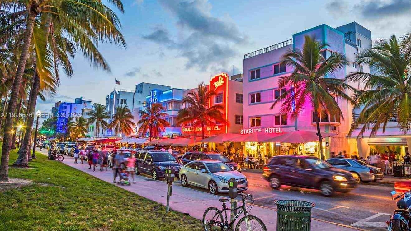 1665 Bay Road, Unit 221 Miami Beach, FL 33139 - Photo 32 of 33 a city street filled with lots of fruit and vegetables