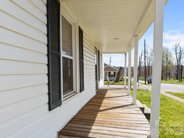 a view of a patio with a backyard