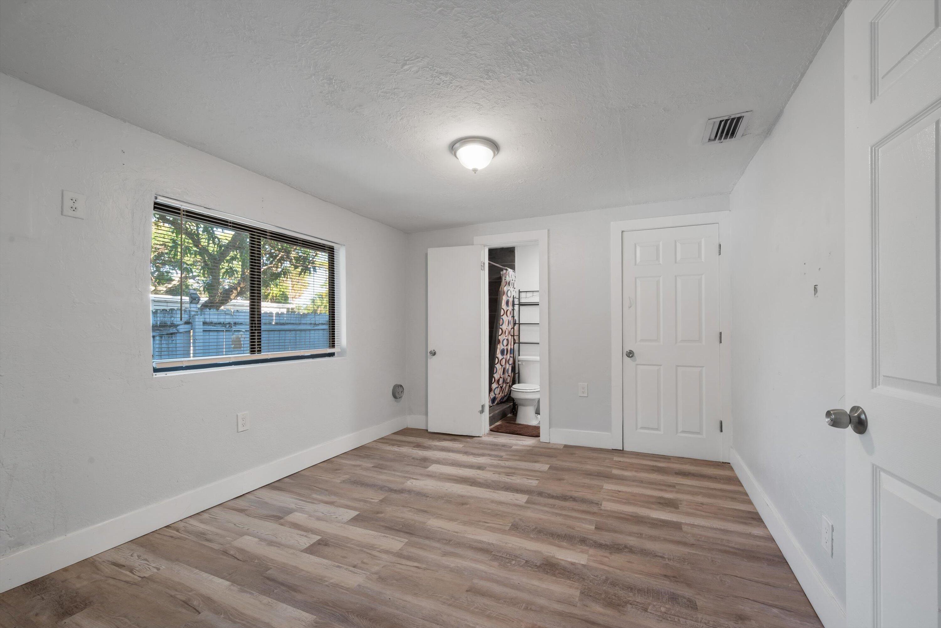 836 Southwest 13th Court Pompano Beach, FL 33060 - Photo 10 of 37 Primary Bedroom