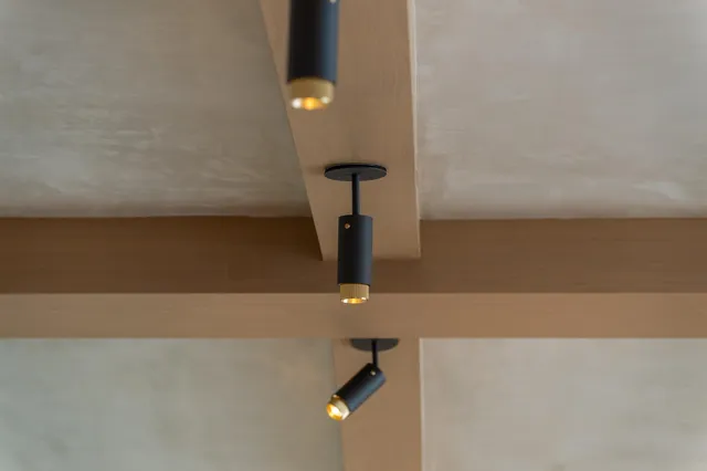 a front view of residential houses with outdoor space