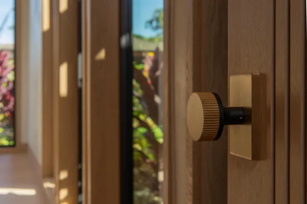 an empty room with closet and a fireplace