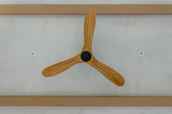 a view of hallway with stairs and wooden floor