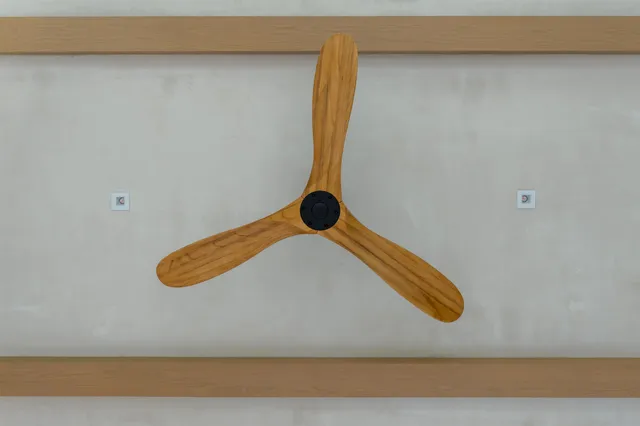 a view of hallway with stairs and wooden floor