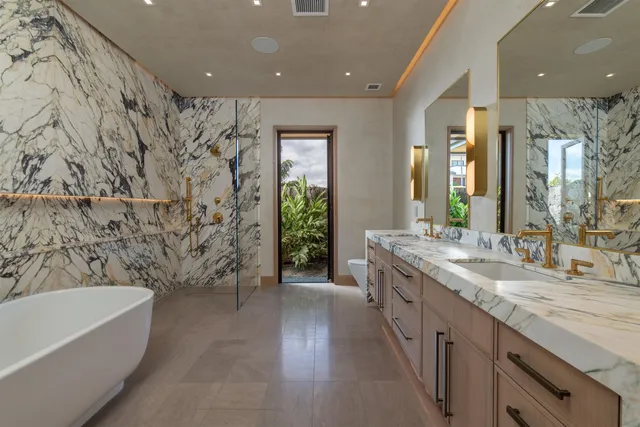 a view of swimming pool with a table and chairs