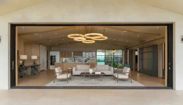 a view of a living room and bathroom