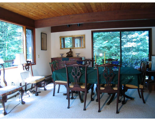 39 Westbrook Lane Westwood, MA 02090 - Photo 4 of 7 a view of a dining room with furniture window and outside view