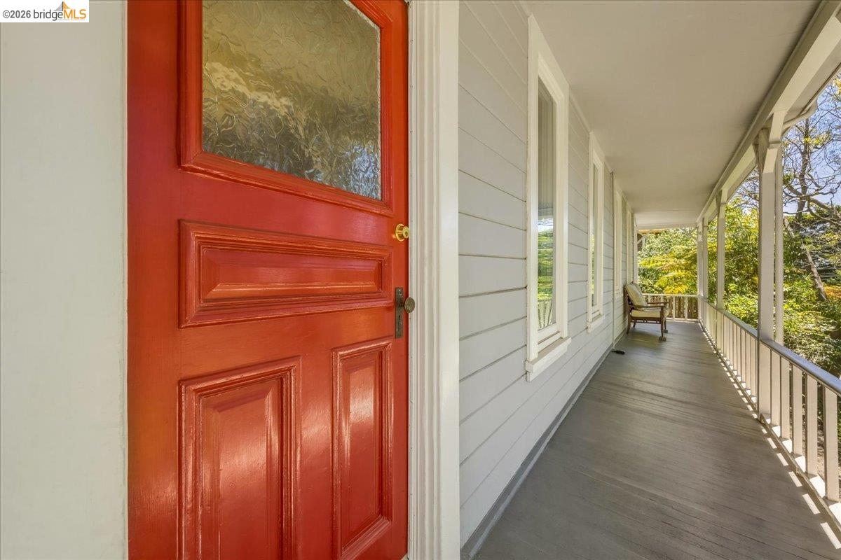 1631 La Vereda Road Berkeley, CA 94709 - Photo 3 of 42 Vibrant paneled entry door with frosted glass accent