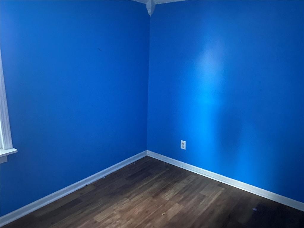 193 Highway 68 Rochester, PA 15074 - Photo 16 of 18 a view of empty room with wooden floor