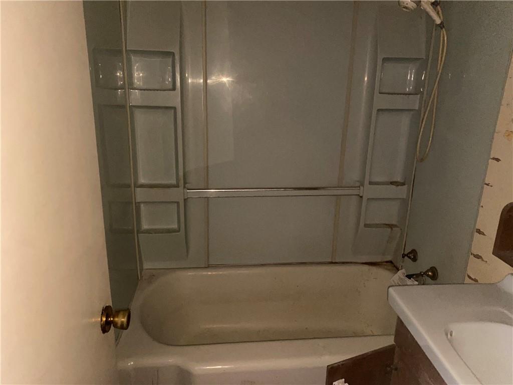 193 Highway 68 Rochester, PA 15074 - Photo 18 of 18 a bathroom with a bathtub