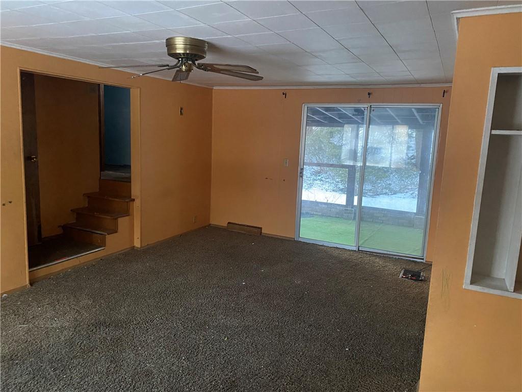 193 Highway 68 Rochester, PA 15074 - Photo 4 of 18 a view of empty room with ceiling fan