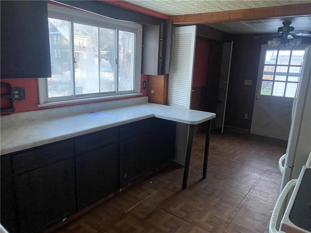 193 Highway 68 Rochester, PA 15074 - Photo 7 of 18 a kitchen with a sink a window and refrigerator
