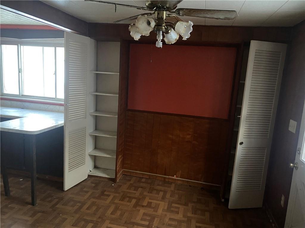 193 Highway 68 Rochester, PA 15074 - Photo 8 of 18 a view of a livingroom with wooden floor and a window