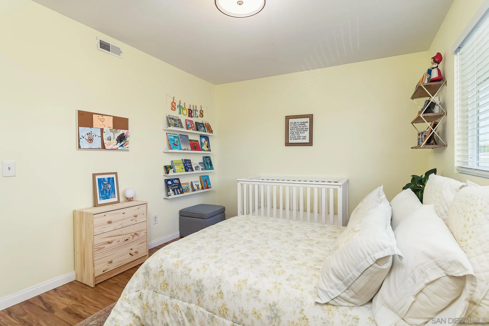 350 G Street, Unit E2 Chula Vista, CA 91910 - Photo 14 of 30 a bedroom with a bed and a cabinets