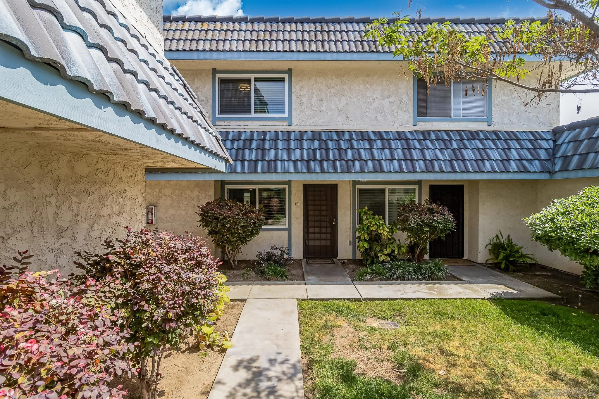 350 G Street, Unit E2 Chula Vista, CA 91910 - Photo 17 of 30 a front view of a house with swimming pool