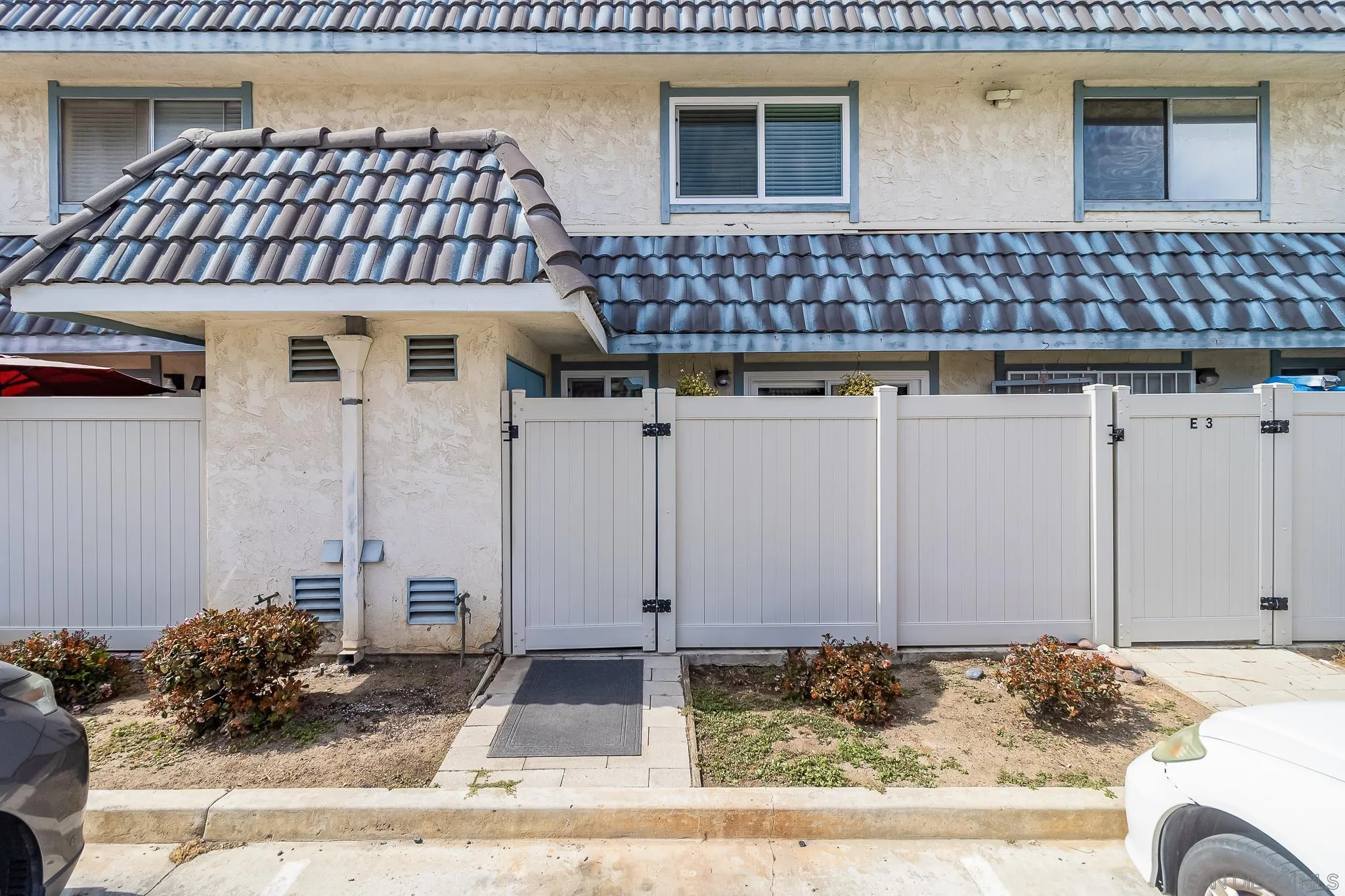 350 G Street, Unit E2 Chula Vista, CA 91910 - Photo 23 of 30 a kitchen with a stove and cabinets