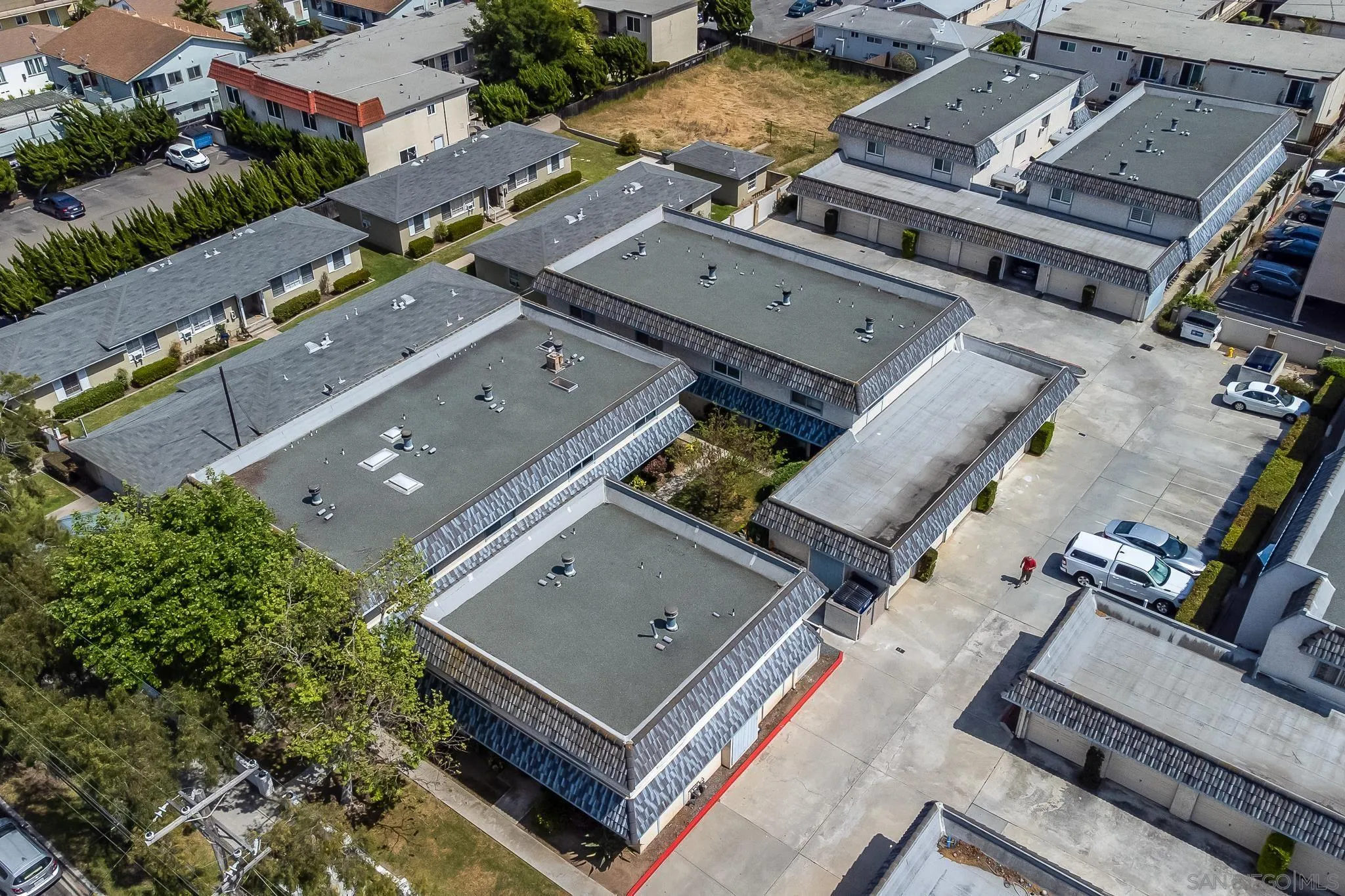 350 G Street, Unit E2 Chula Vista, CA 91910 - Photo 25 of 30 an aerial view of residential houses with outdoor space
