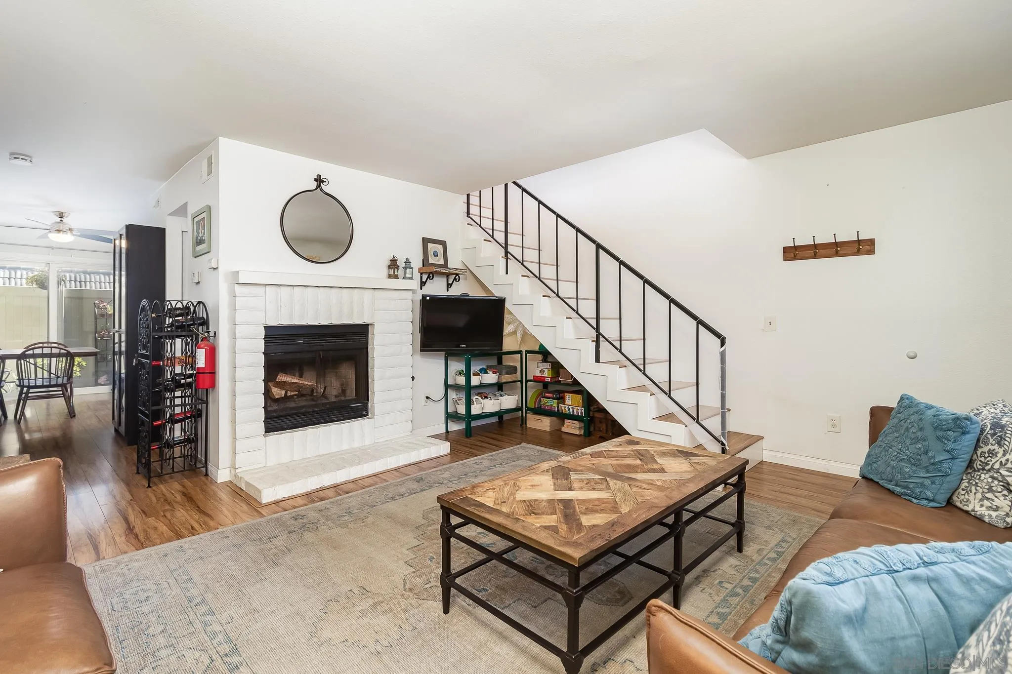 350 G Street, Unit E2 Chula Vista, CA 91910 - Photo 5 of 30 a living room with furniture and a fireplace