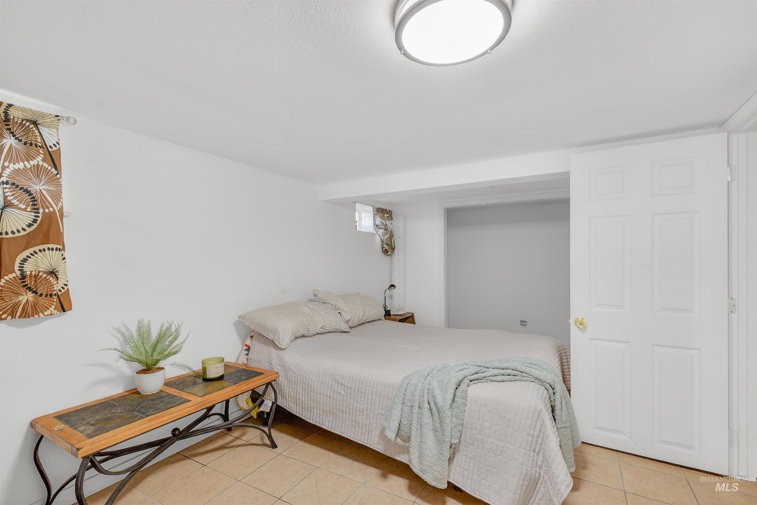 601 12th Street Clarkston, WA 99403 - Photo 14 of 21 Bedroom featuring light tile patterned floors