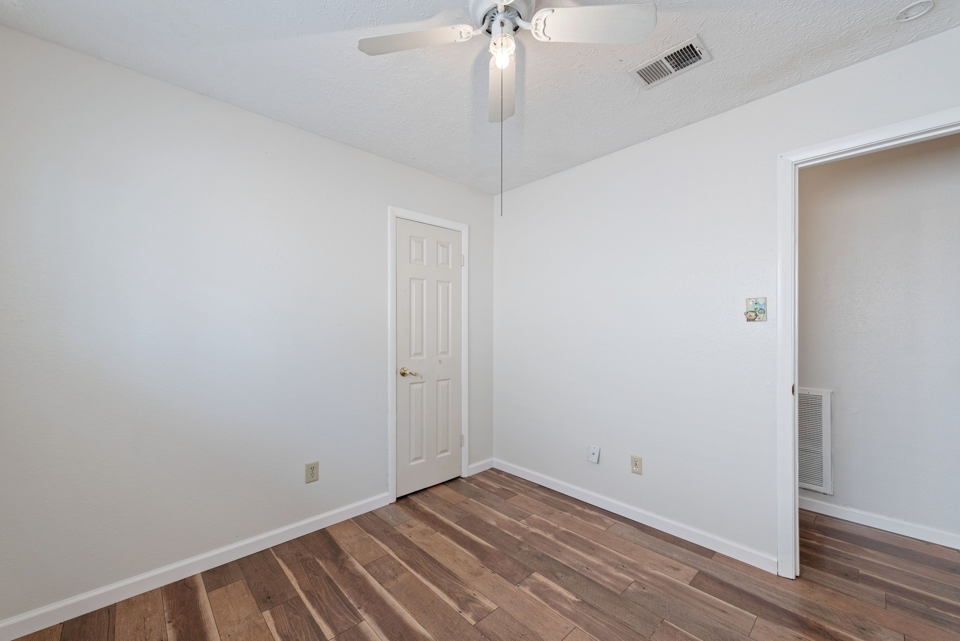 9622 Birsay Street Spring, TX 77379 - Photo 13 of 17 Down the hall is the middle of the three extra bedrooms.