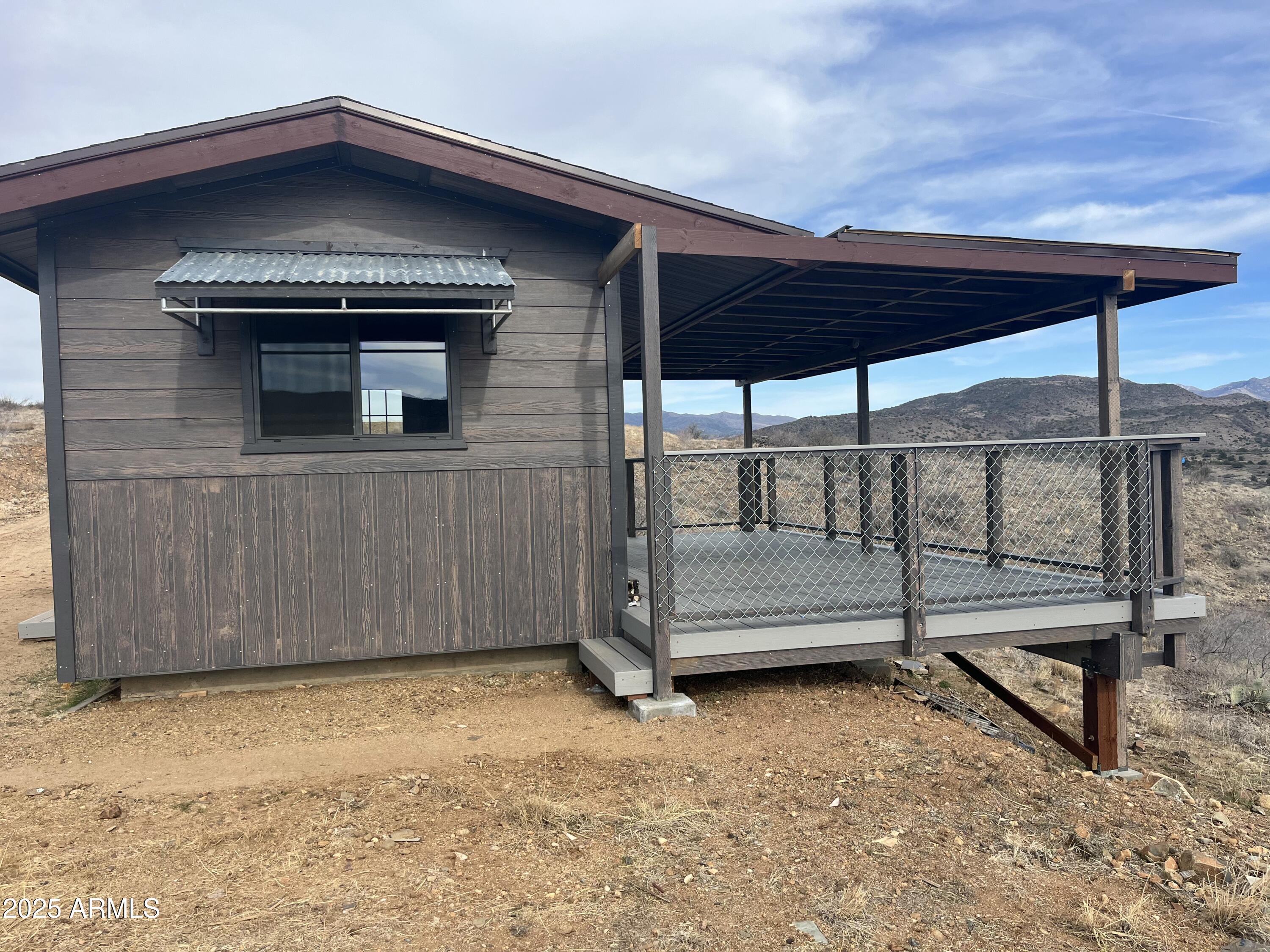 0 South Walnut Grove, Unit 3A Kirkland, AZ 86332 - Photo 6 of 8 a view of backyard with small cabin
